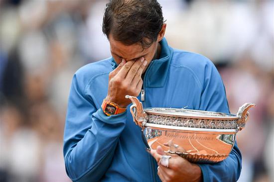 Rafael Nadal of Spain reacts during the awarding ceremony after the men's singles final against Dominic Thiem of Austria at the 2018 French Open Tournament in Paris, France on Sunday. Rafael Nadal won 3-0 and claimed the title.