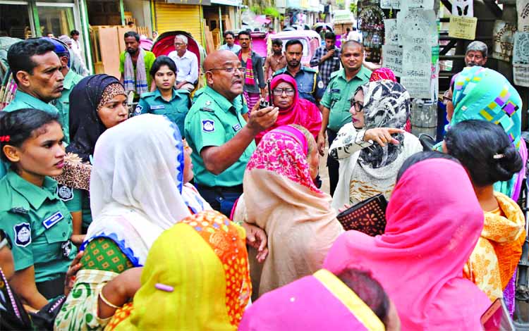 Leaders and activists of Jatiyatabadi Mohila Dal thronged in front of the Old Central Jail in city after hearing the news that their Party Chairperson Begum Khaleda Zia to be taken to a hospital for her medical check up on Monday.