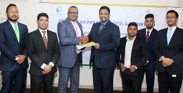M Khorshed Anowar, Head of Retail Banking of Eastern Bank Limited (EBL) and Mohammad Imran Humayun Khan, Head of Sales and Marketing of Ocean Paradise Hotel, Cox's Bazar, exchanging an agreement signing documents in the city recently. Under the deal, EBL