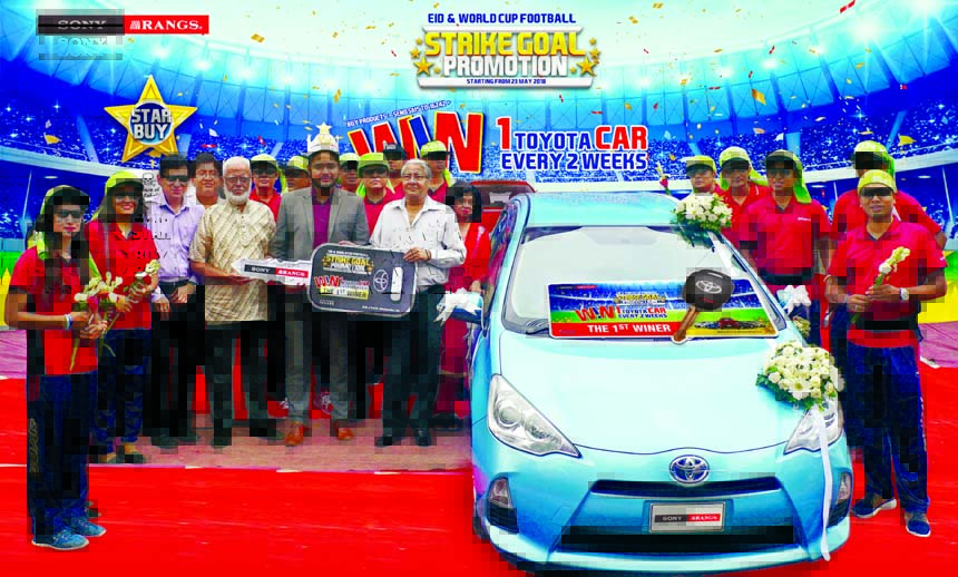 Aktar Hussain, Chairman of Rangs Group of Companies Limited, handing over the key of Car to a winner as under their running sales campaign, on the occasion of upcoming Eid al-Fitr and FIFA World Cup-2018 titled "STRIKE GOAL PROMOTION 2018" at its Sony-R