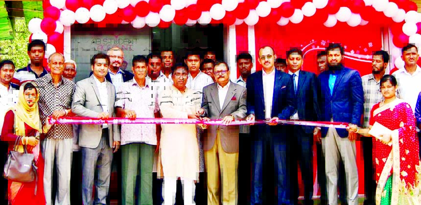 Sajjad Hussain, DMD of AB Bank Limited, inaugurating its Agent Banking point at Montola Bazar of Madhabpur in Habiganj recently. Senior Executives of the bank and local elites were also present.