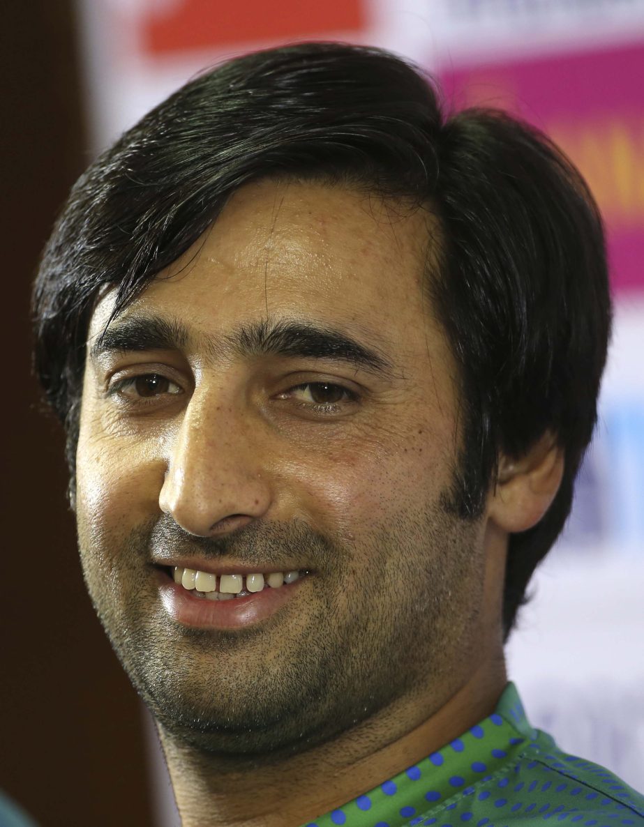 Afghanistan cricket team captain Asghar Stanikzai smiles as he listens to a question during a press conference before attending a training session ahead of one-off Test match against India in Bangalore, India on Wednesday.