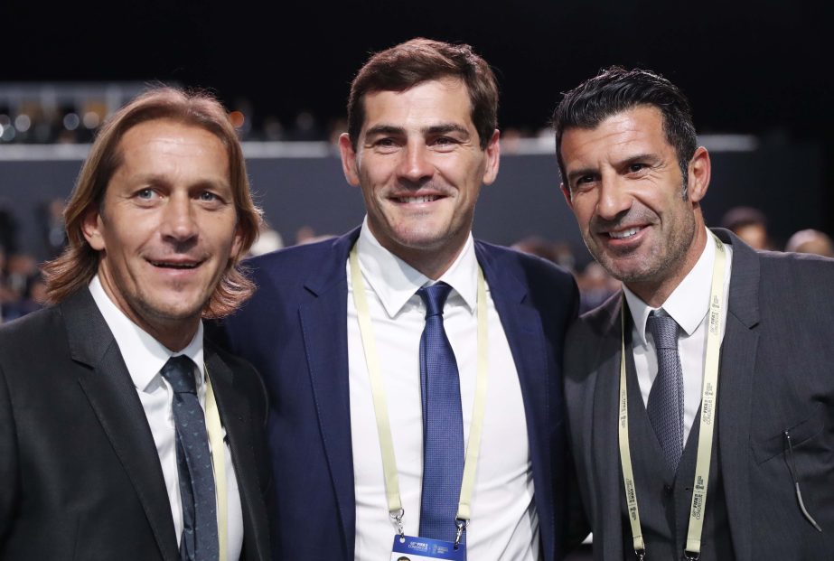 Spain's Miguel Salgado, Iker Casillas and Portugal's Luis Figo (from left) pose for a photographer prior to the FIFA congress on the eve of the opener of the 2018 soccer World Cup in Moscow, Russia on Wednesday. The congress in Moscow is set to choose t