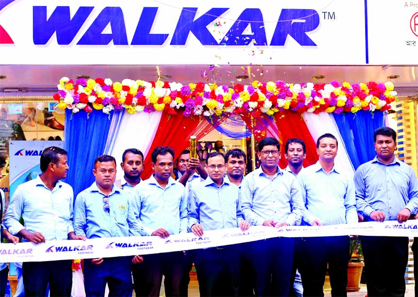 RN Paul, Managing Director of RFL Group, inaugurating the Walkar outlet, (footwear brand of the group) at Halishahar in Chattogram recently. Kamrul Hasan, Chief Operating Officer, Fahim Hossain, Head of Marketing, Mainul Hasan, Brand Manager and Shahjahan