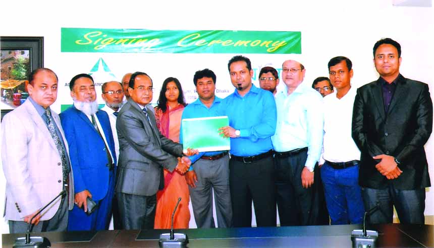 Md. Anwar Hossain, CEO of Agrani Insurance Company Limited and Muhtasim Mahdi Al Farooque, Managing Director of Zantrik Limited, exchanging a MoU signing documents at the insurance company head office in the city recently. Unde the deal, the insurance com