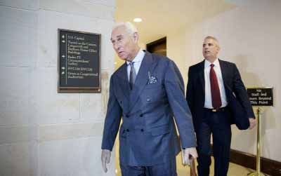 Longtime Donald Trump associate Roger Stone arrives to testify before the House Intelligence Committee, on Capitol Hill in Washington.
