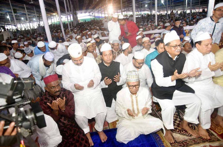 CCC Mayor A J M Nasir Uddin offering Munajat with Elite at Eid congregation at Jamiyatul Falah Eidgah maidan on Saturday.