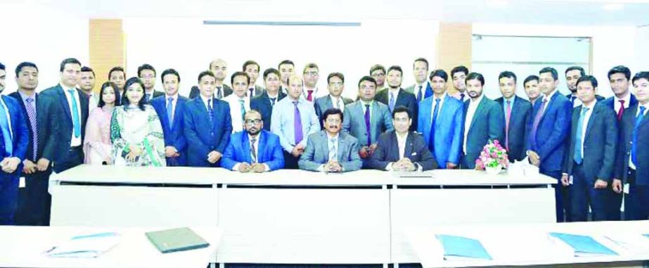 Md. Mehmood Husain, Managing Director of NRB Bank Limited poses with the participants of a 5-day long training programme on "Credit Management" at the bank's Institute of Learning and Development Center recently. Imran Ahmed FCA and Mohammad Rafiqul Is