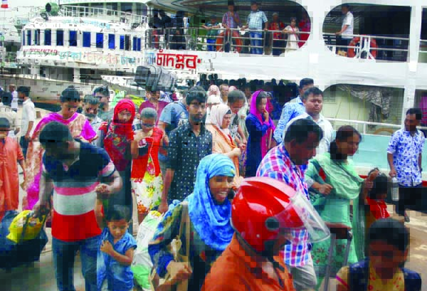 City-bound passengers have started returning after celebrating Eid-ul-Fitr with their near and dear ones at their ancestral homes. The snap was taken from Sadarghat Launch Terminal on Tuesday.