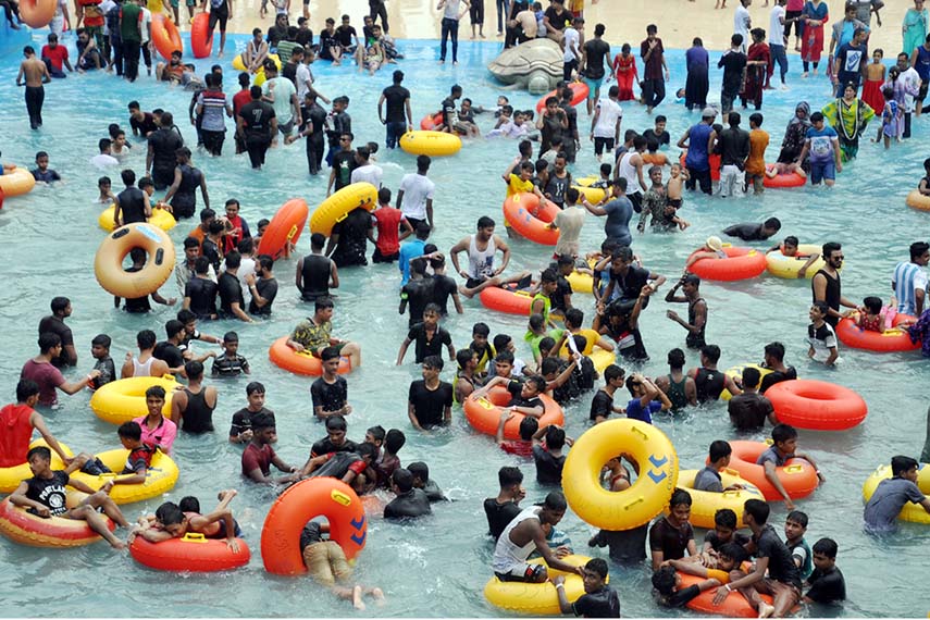 Tourists from different parts of the country enjoying at Foy's Lake in Chattogram City on Tuesday.