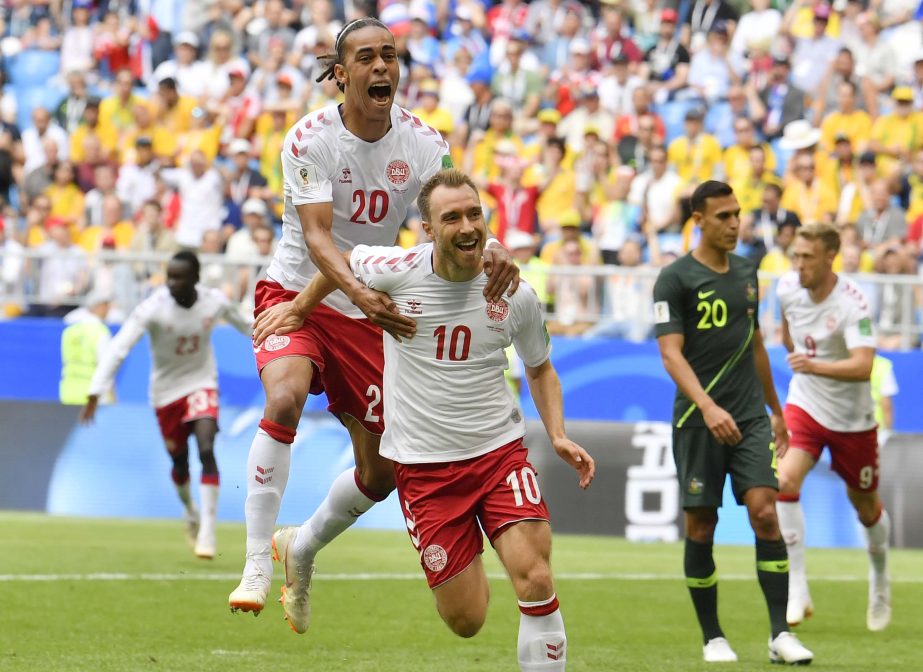 Denmark's Christian Eriksen is congratulated by his teammate Yussuf Yurary Poulsen after scoring the opening goal during the group C match between Denmark and Australia at the World Cup match in Samara, Russia on Thursday. Denmark, Australia match ended