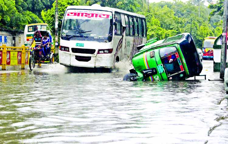 Due to yesterday's heavy rain and in absence of adequate drainage system, a road in Rajarbagh area inundated by water causing road accident.