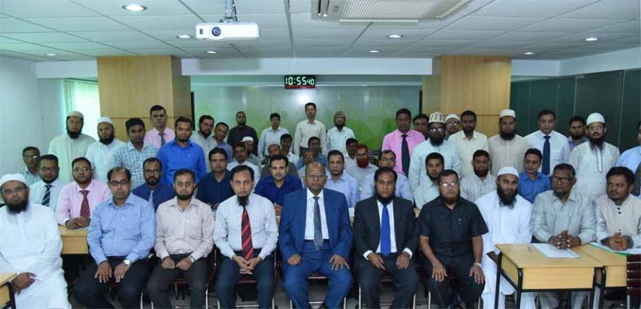 Md. Habibur Rahman, Managing Director of Al-Arafah Islami Bank Limited, poses with the participants of training on "Prevention of Money Laundering and Combating Financing of Terrorism" organised by the banks Training and Research Institute at its head o