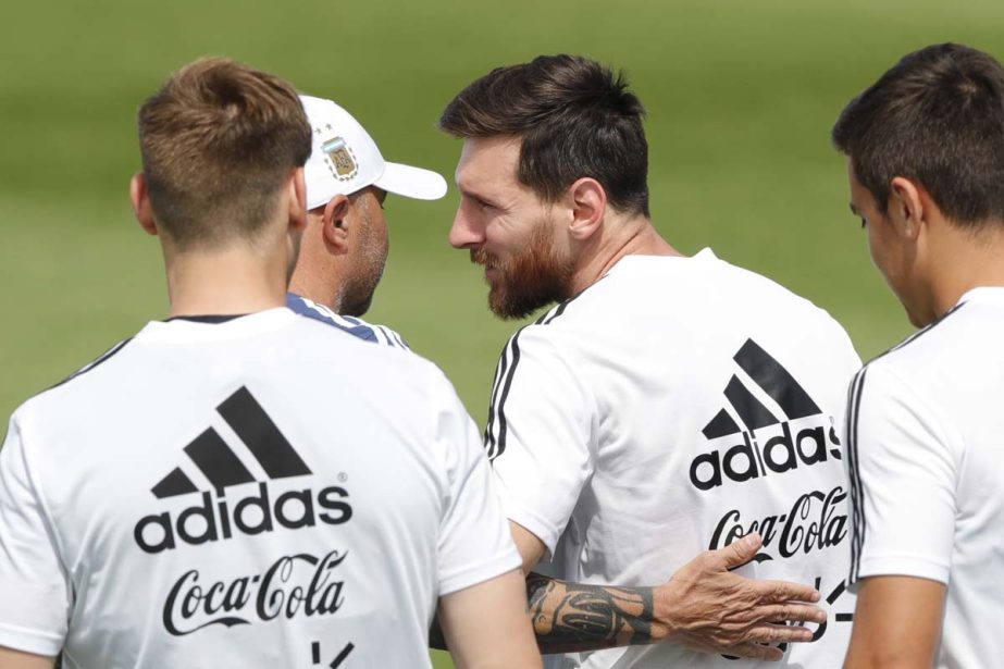 Lionel Messi is congratulated by coach Jorge Sampaoli on the day of his birthday during a training session of Argentina at the 2018 soccer World Cup in Bronnitsy, Russia on Sunday.