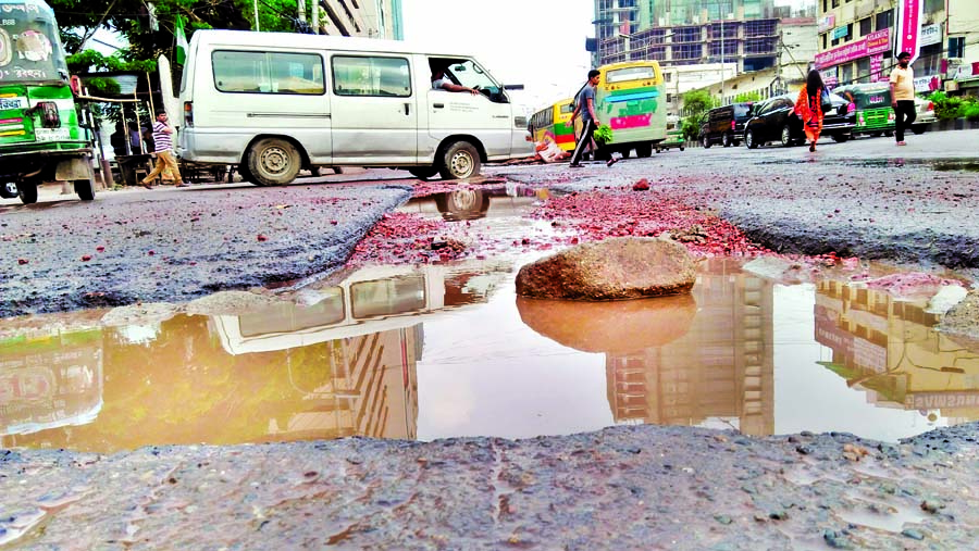 Sorry state of a busy road in city's Karwan Bazar area. This picture was snapped on Sunday.