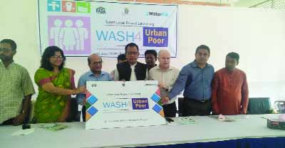 SAKHIPUR (Tangail): Abu Hanif Azad, Mayor, Sakhipur Pourashava and Moushumi Sarkar Rakhi, UNO inaugurating Wash For Urban Poor Project at Sakhipur Upazila on Sunday.