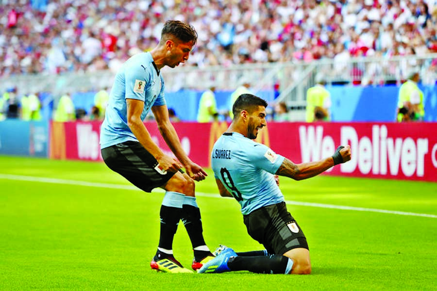 Luis Suarez celebrates after scoring goal during the group A match between Uruguay and Russia at the World Cup match at the Samara Arena (3-0) on Monday.