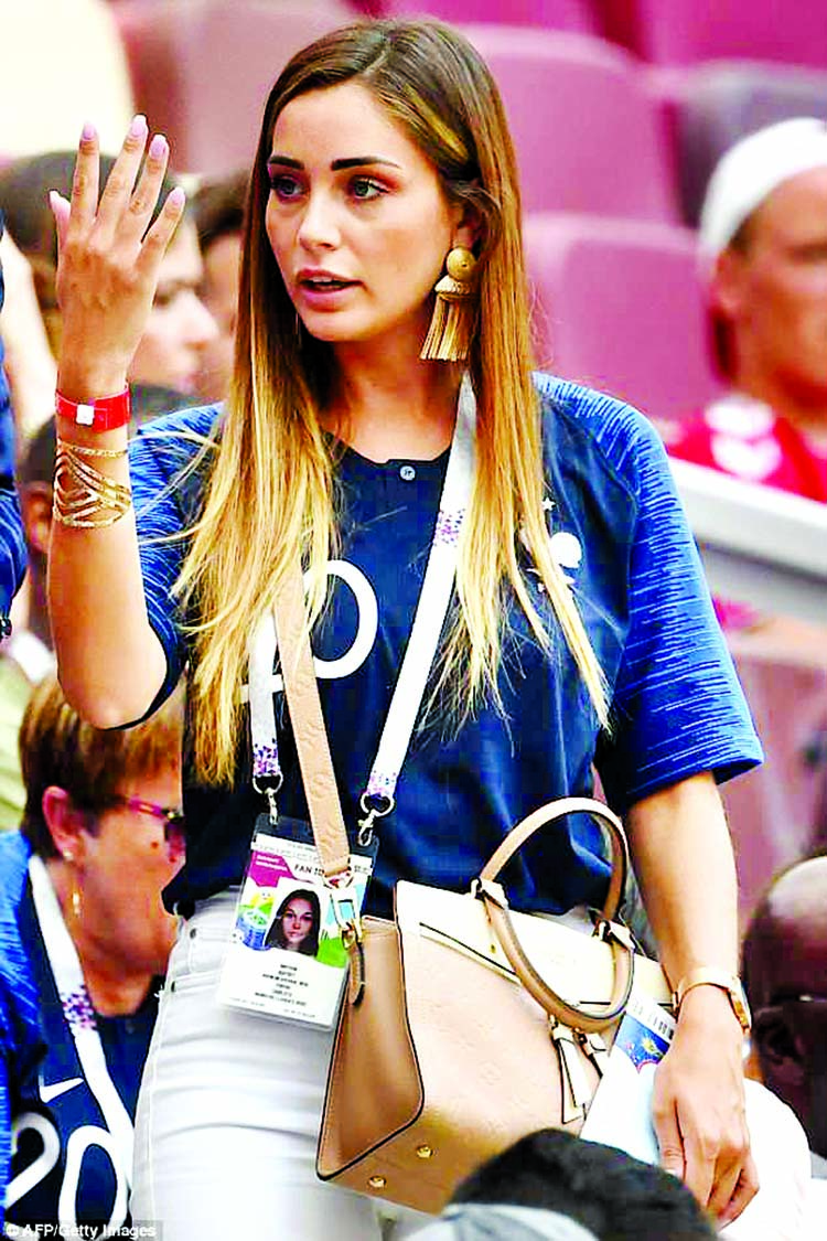 Charlotte Pirroni, girlfriend of France's forward Florian Thauvin wore a Louis Vuitton bag
