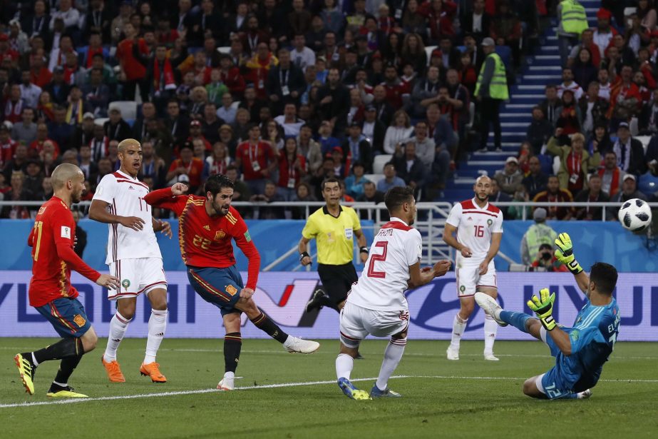 Spain's Isco (3rd left) scores his side's opening goal during the group B match between Spain and Morocco at the 2018 soccer World Cup at the Kaliningrad Stadium in Kaliningrad, Russia on Monday.