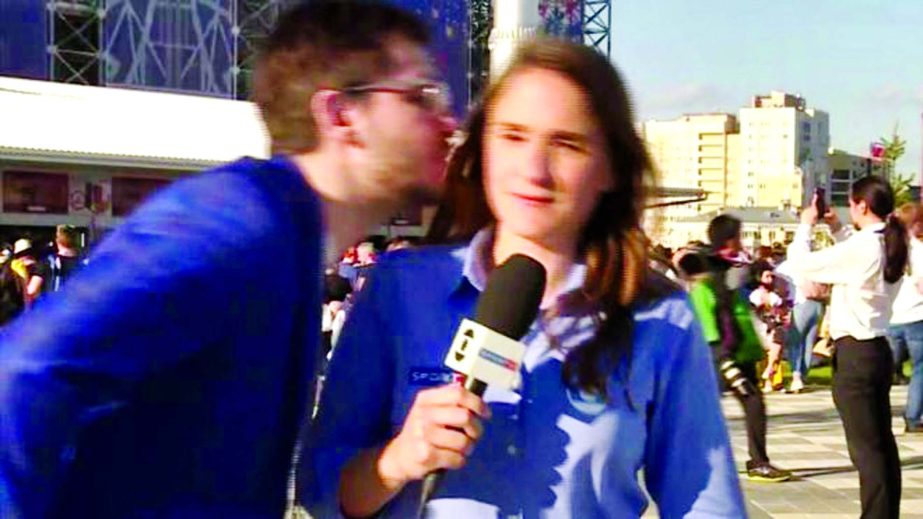 A man tried to kiss reporter Julia Guimaraes while she was working in Yekaterinburg.