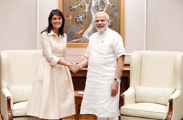 Indian Prime Minister Narendra Modi shakes hands with US Ambassador to the United Nations Nikki Haley before the start of their meeting in New Delhi