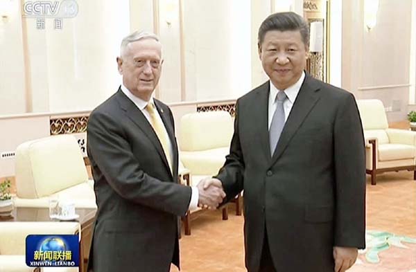 Chinese President Xi Jinping, (right), told U.S. Secretary of Defense James Mattis that Beijing would not budge on territorial matters.