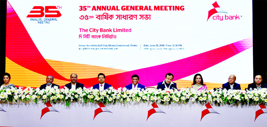 Mohammed Shoeb, Chairman of City Bank Limited, presiding over its 35th AGM at Kurmitola Golf Club in Dhaka Cantonment on Thursday. The AGM approved 19 percent cash dividend and 5 percent stock dividend for its shareholders for the year 2017. Sohail R K Hu