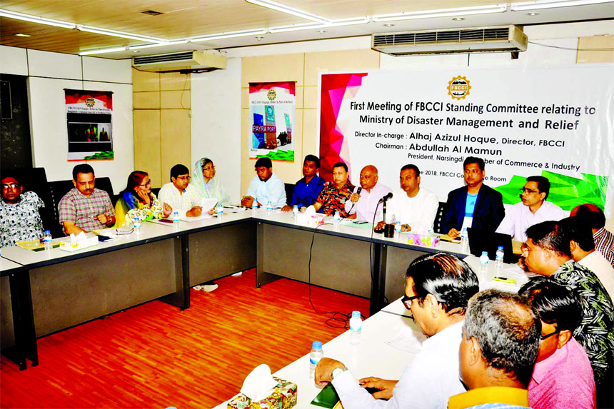 Abdullah Al Mamun, Chairman of the Standing Committee, presiding over a meeting of FBCCI Standing Committee relating to Ministry of Disaster Management and Relief on Thursday at its Conference Centre. Azizul Haque, Director-in-Charge of the committee, Eng
