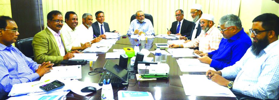 Shibbir Mahmud, Chairman of the Board of Directors of Islamic Finance and Investment Limited, presiding over its 237th meeting at its head office in the city recently. AZM Saleh, Managing Director, Rezzakul Haider, Anis Salahuddin Ahmad, Vice Chairmen, An