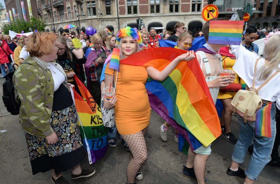 People gather to participate in the Pride Parade Saturday June 30, 2018, in Helsinki, Finland. Some thousands participated in the parade celebrating differance.