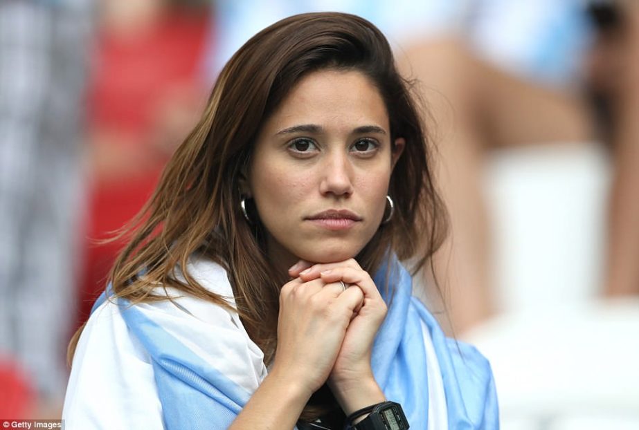 An Argentinian fan looks on pensively as the game unfolds. Despite a late goal from Sergio Aguero, Argentina were unable to salvage a draw.