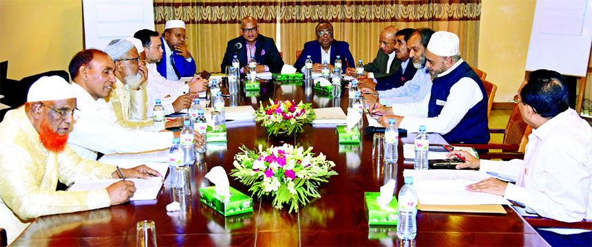 Abdus Samad (Labu), Chairman of Al-Arafah Islami Bank Limited, presiding over its 323rd board of directors' meeting at a resort in Sylhet recently. MD, DMDs and company secretary were also present.