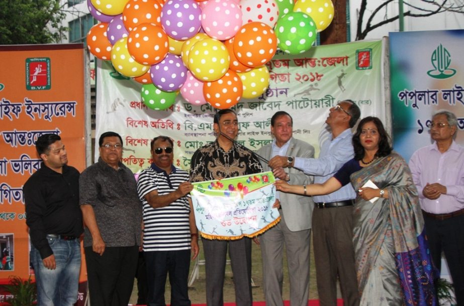 Inspector General of Bangladesh Police Dr Mohammad Javed Patwari inaugurating the Popular Life Insurance 17th Inter-District Women's Volleyball Competition by releasing the balloons as the chief guest at Nur Hossain National Volleyball Stadium on Monday.