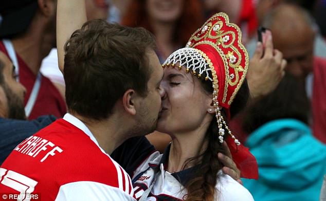 Sealed with a kiss! Fans rejoiced after watching the host nation send Spain home on penalties