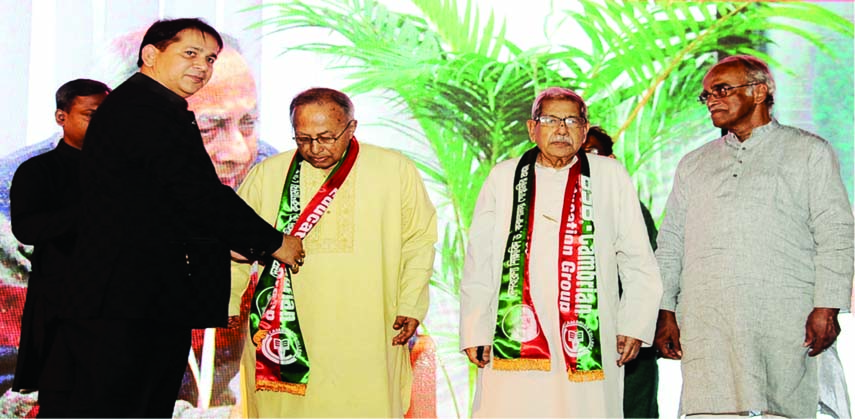 Two national professors Dr Anisuzzaman and Dr Rafiqul Islam being accorded reception by BSB-Cambrian Education Group at a ceremony held recently in Abdul Karim Sahityabisharad Auditorium of Bangla Academy in the city marking first death anniversary of Dr