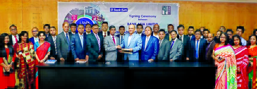 Md. Arfan Ali, Managing Director of Bank Asia Limited and Hasan Imam, Chairman of Bangladesh SME Corporation Limited, exchanging an agreement documents at the bank's head office in the city recently to accelerate dairy-based loan facilities to rural area