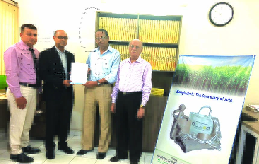 Fazlul Haq, Chief Accountant of MASK Associates (Pvt) Ltd, a Jute exporter company, receiving credit rating report from Pranabesh Roy, Chief Strategy Officer of Alpha Rating Limited at the company's office recently. It retained long term rating "A" wit