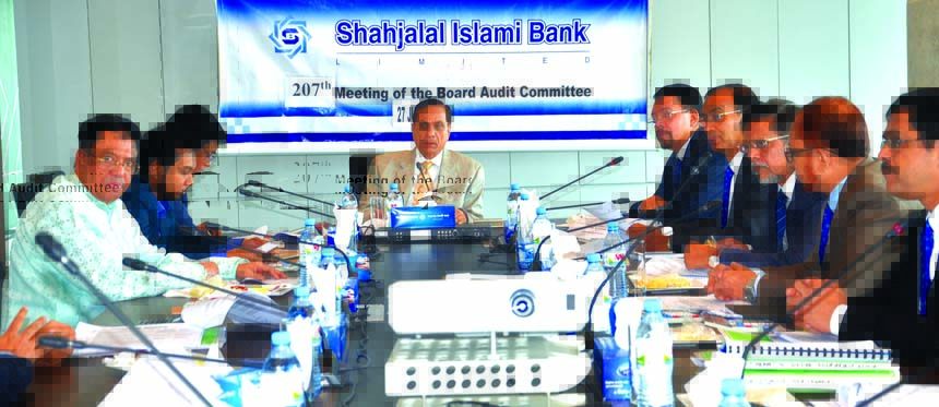 Mosharraf Hossain Chowdhury, Chairman of the Audit Committee of Shahjalal Islami Bank Limited, presiding over its 207th meeting at the bank's head office in the city recently. Farman R Chowdhury, Managing Director, Abdul Halim, Khorshed Alam Khan, Md. Mo