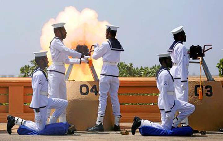 Sri Lanka's navy fires a gun salute during the 70th Independence Day celebrations in Colombo.