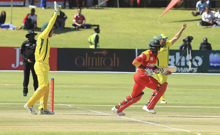 Australian players appeal for the wicket of Zimbabwean batsman Tarisai Musakanda (centre) during the T20I cricket match between Zimbabwe and Australia at Harare Sports Club on Tuesday.
