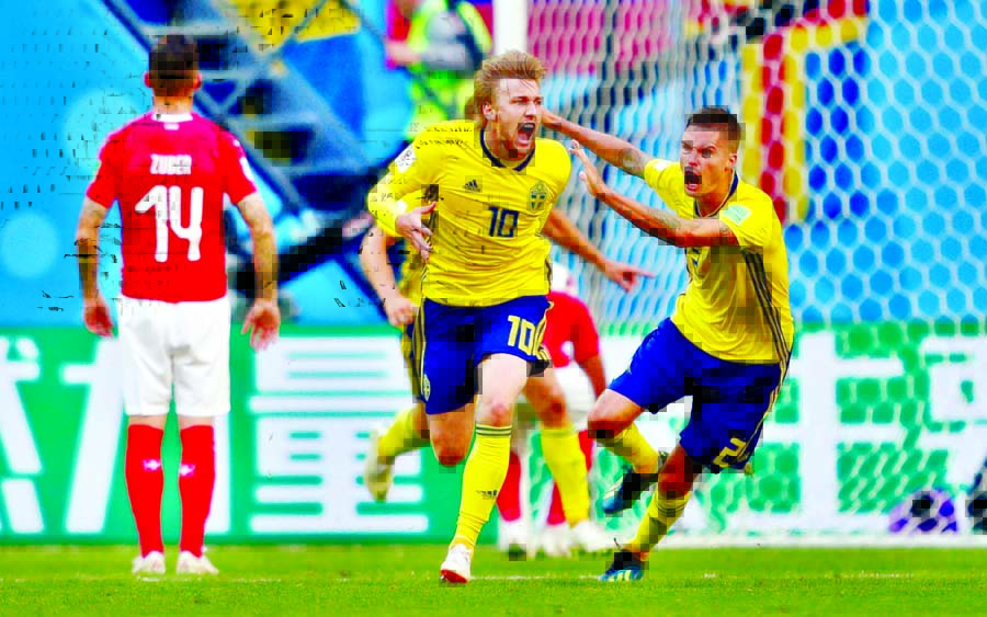 Sweden striker celebrates after netting a goal against Switzerland at 66th minute in World Cup round sixteen match in Russia on Tuesday.