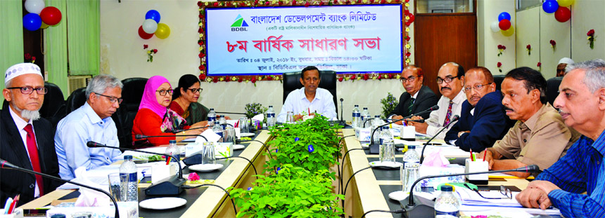 Shahabuddin Ahmed, Director of Bangladesh Development Bank Limited and Secretary, Ministry of Food, presiding over the 8th Annual General Meeting of the bank at the bank's head office on Wednesday. Quamrun Nahar Ahmed, Additional Secretary, Financial I