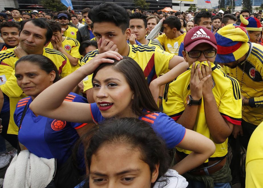 Colombia fans watch an outdoor live telecast of the 2018 soccer World Cup match between Colombia and England in Bogota, Colombia on Tuesday.