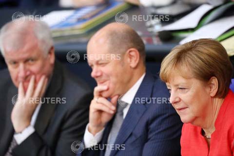 German Chancellor Angela Merkel, Finance Minister Olaf Scholz and German Interior Minister Horst Seehofer attend a budget debate at the lower house of parliament Bundestag in Berlin.