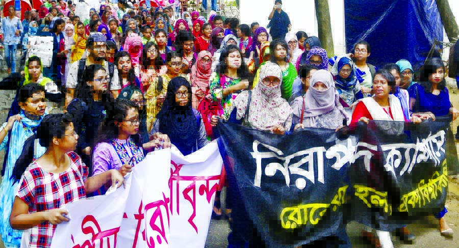 Female students of Begum Rokeya Hall and Shamsunnahar Hall of Dhaka University brought out a procession on the DU campus on Thursday demanding safe campus for them.