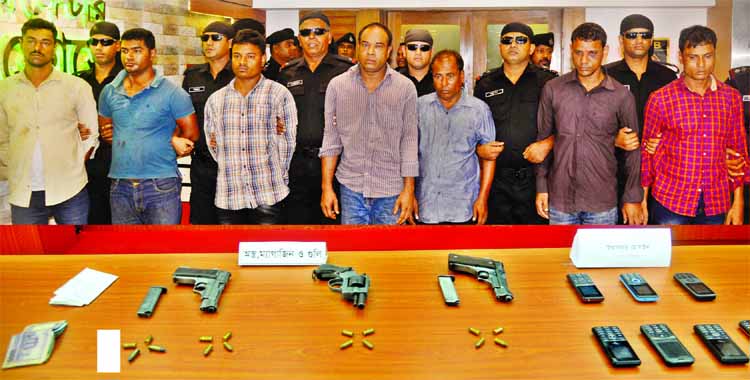 Seven members of snatchers gang were arrested by RAB-1 with three pistols and some bullets from city's Uttara area. This picture was taken from RAB media centre on Thursday.
