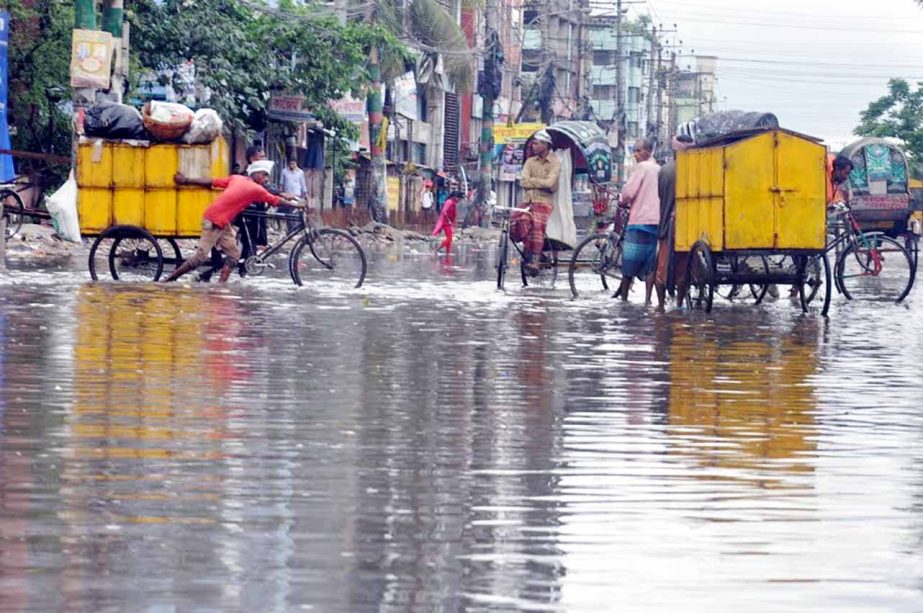 Roads in Chattogrm city become vulnerable due to heavy rain. This picture was taken yesterday.