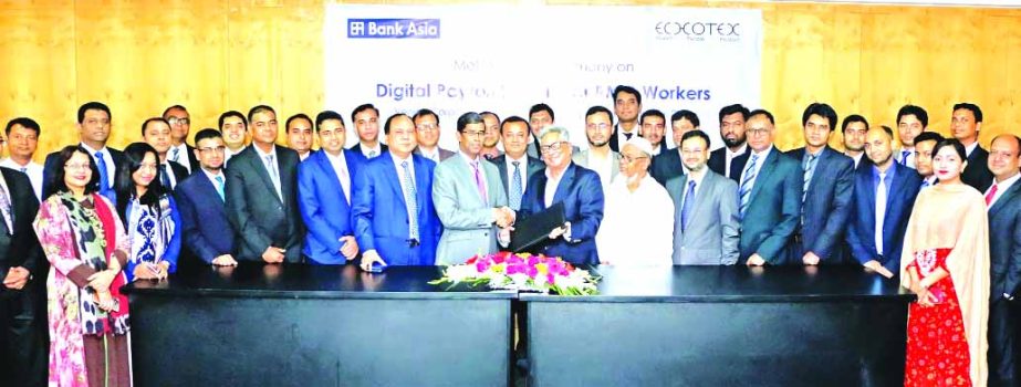 Arfan Ali, President and Managing Director of Bank Asia Limited and Mohammed Bin Quasem, Director of Echotex Limited, exchanging an MoU signing documents on Digital Payroll System for RMG workers at the banks head office in the city on Thursday. Muhammed