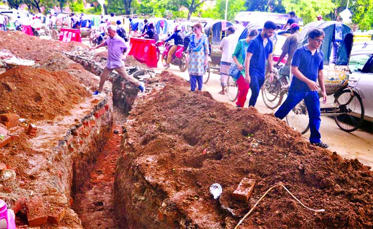 Frequent road digging in different areas in the city for utility services causing immense sufferings to the passengers and also pedestrians for free movement. The snap was taken from Doel Chattar area on Friday.