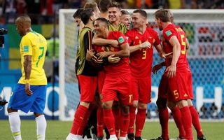 Belgium's Youri Tielemans celebrates with teammates after the match. Reuters